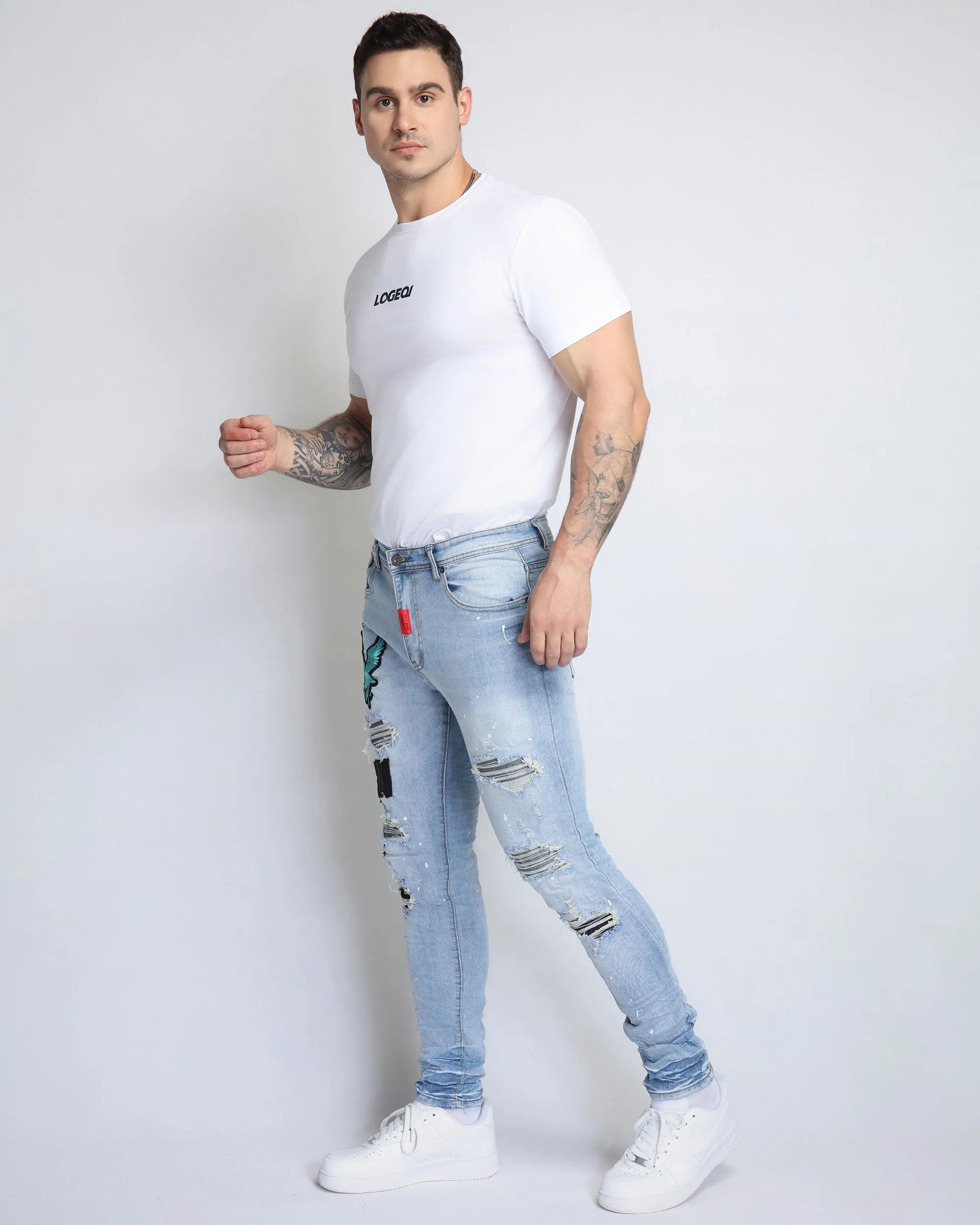 Distressed Blue Ripped Jeans with Exquisite Embroidery