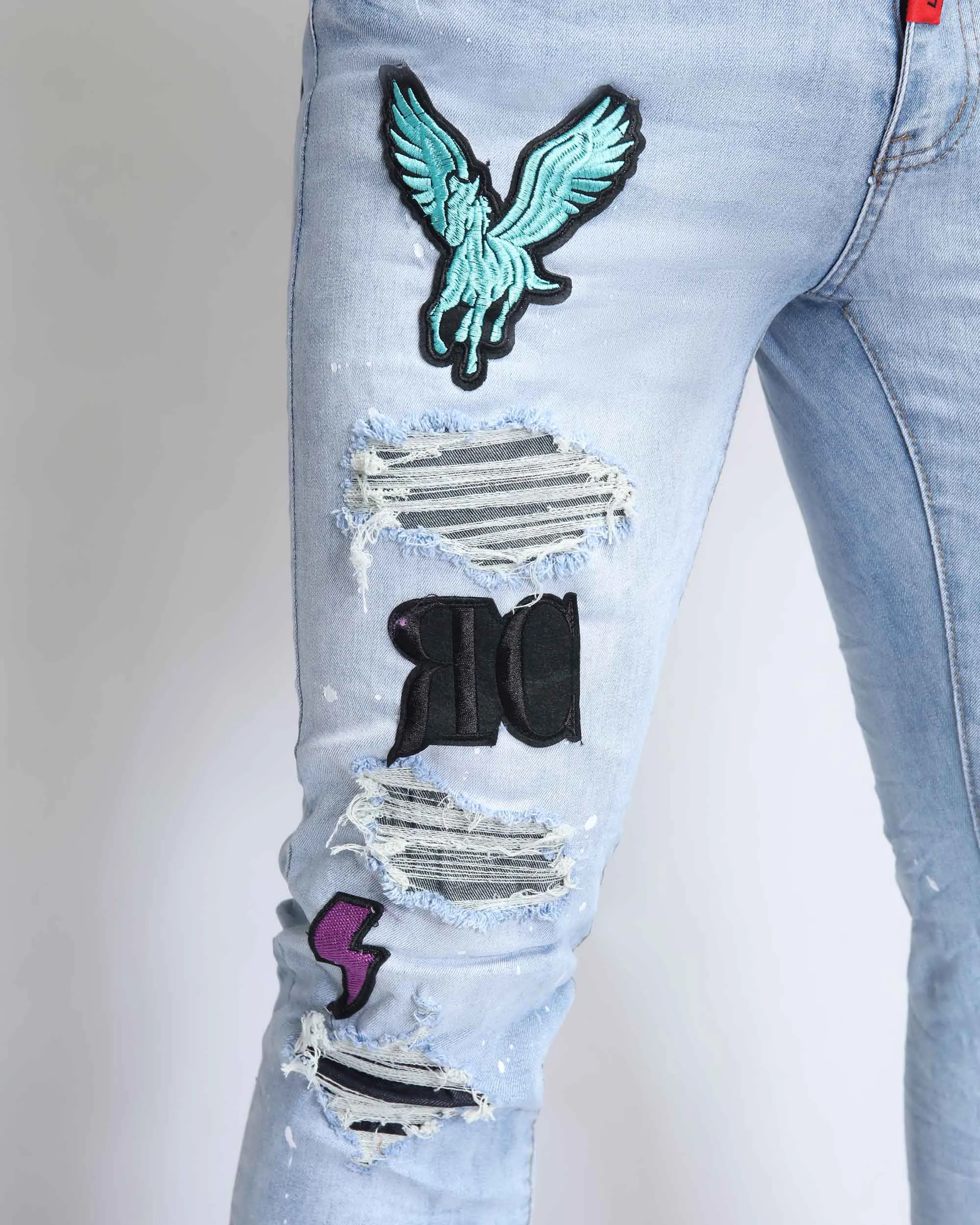 Distressed Blue Ripped Jeans with Exquisite Embroidery