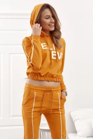 Fashionable sports set with a short honey blouse 1053